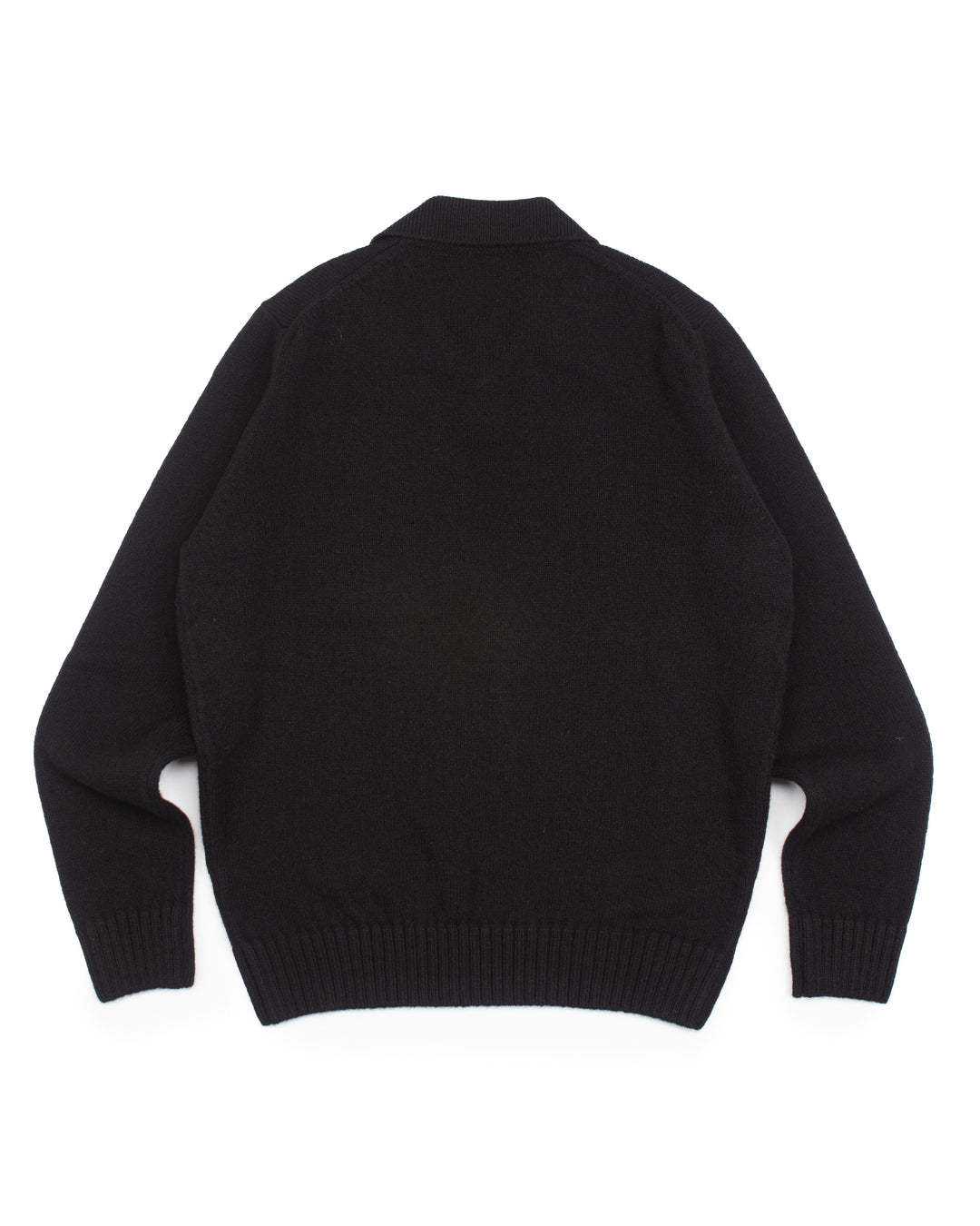 Fly Polo in Black Shetland