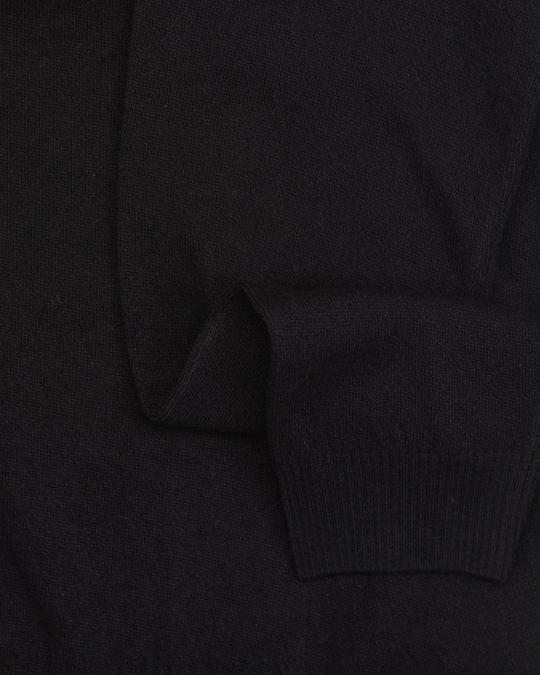 The Ruken Polo Sweater in Black