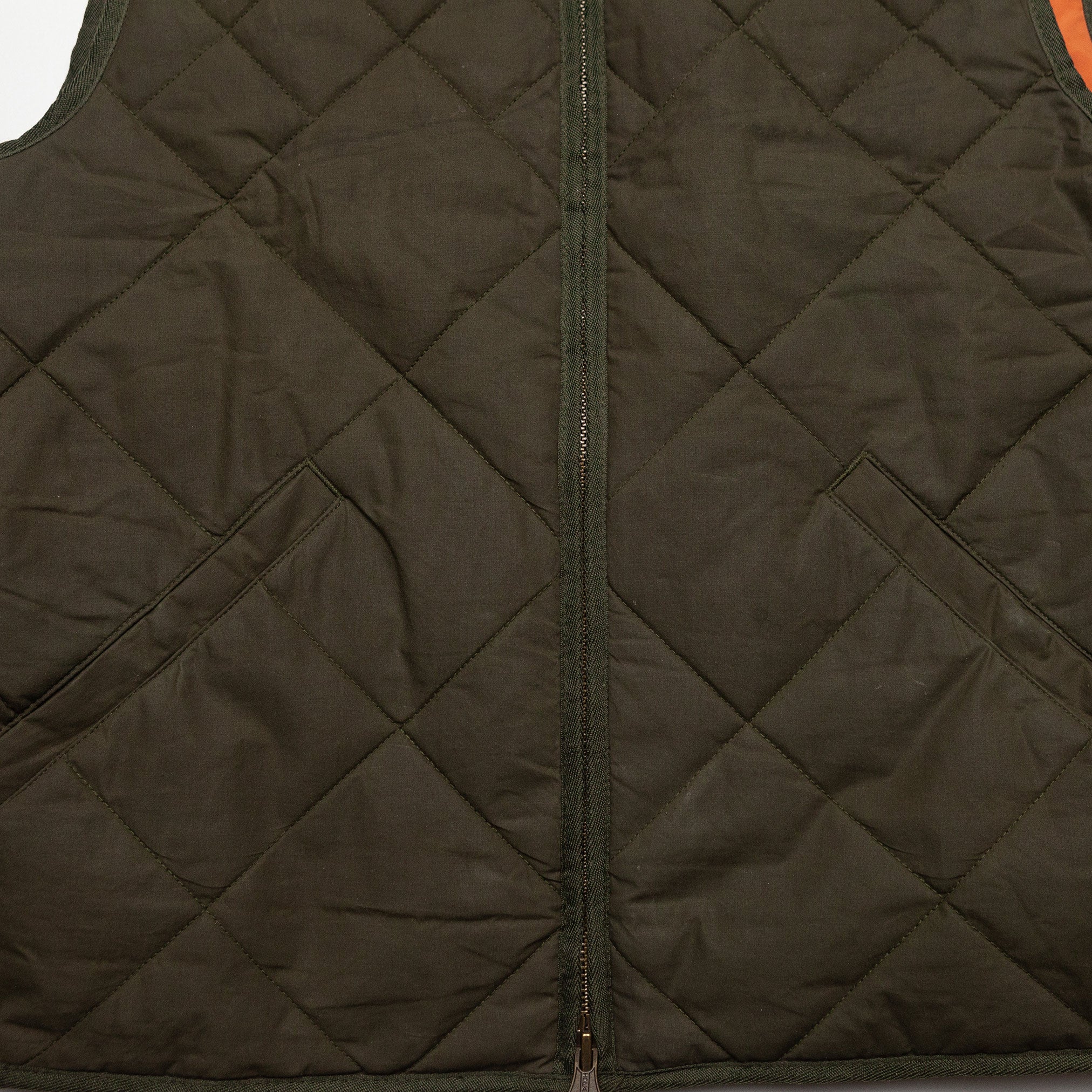 The Quilted Bomber Vest in Olive Dry Wax - M/40
